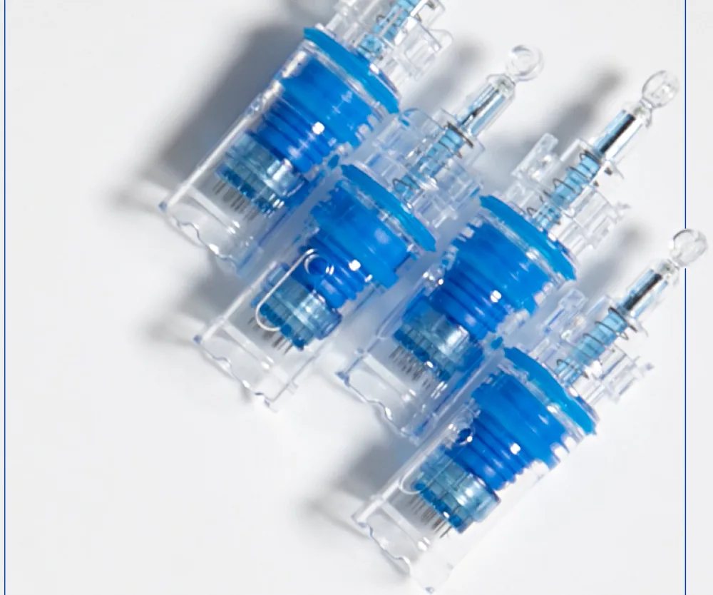 Four sealed single-use Dermapen 4 needle cartridges, each holding sixteen fine stainless steel needles.